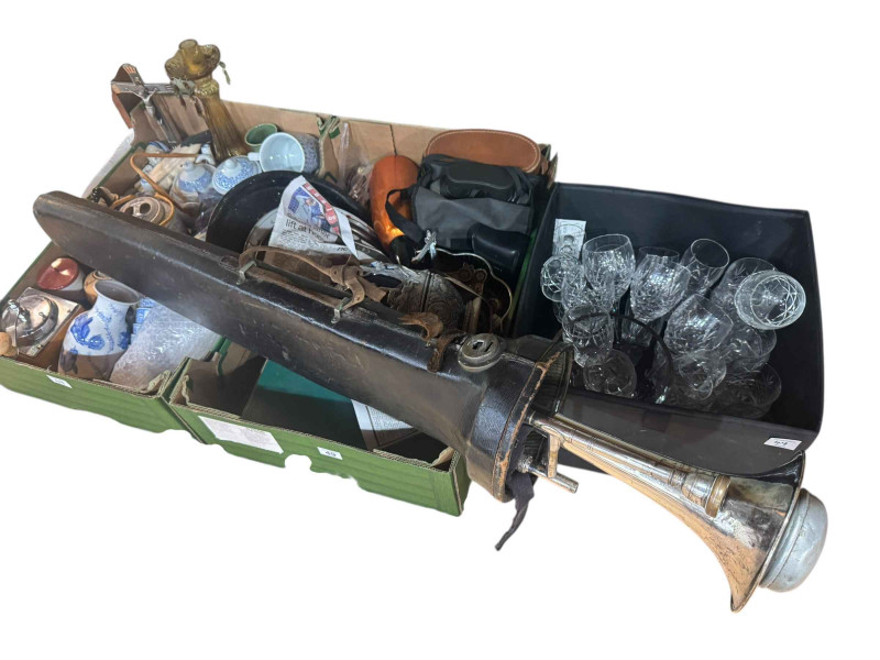 Three boxes of glass and china, binoculars, cased trombone, etc.
