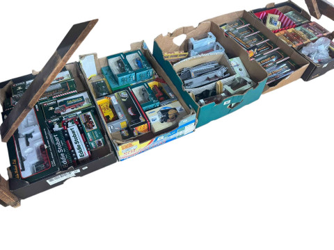 Five boxes of model vehicles including Eddie Stobart and other Corgi models,...