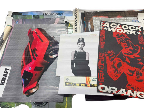 Collection of film and music posters including Tony Scott's 'The Hunger' featuring David Bowie and Catherine Deneuve. thumbnail