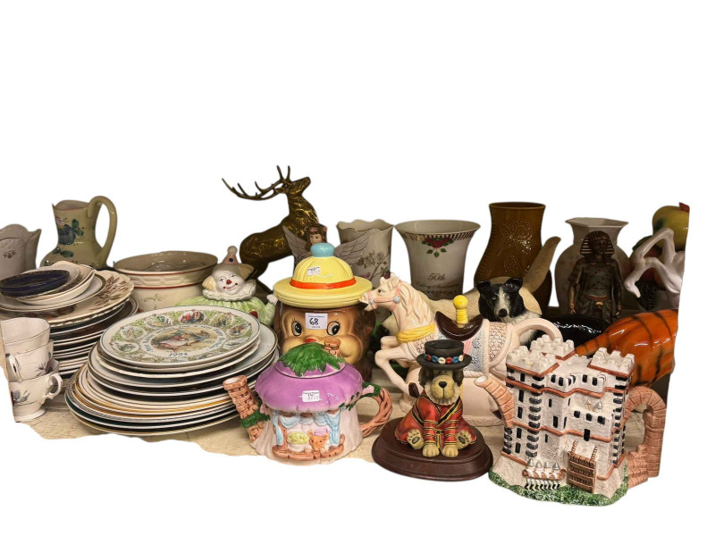 Full shelf of glass and china including figurines, large Chinese vase, animal ornaments, teawares, etc.