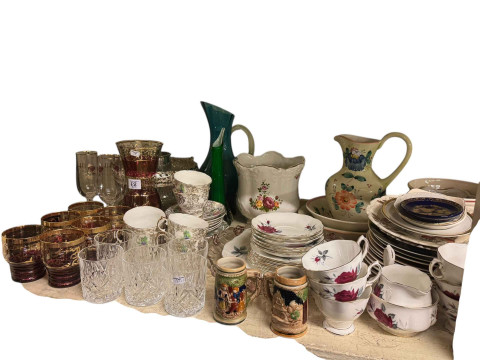 Full shelf of glass and china including figurines, large Chinese vase, animal ornaments, teawares, etc. thumbnail