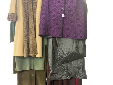 Collection of vintage ladies clothing including coats, pair of boots,...