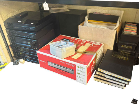 Pioneer stacking system with speakers, Sony DVD player, LP records and...