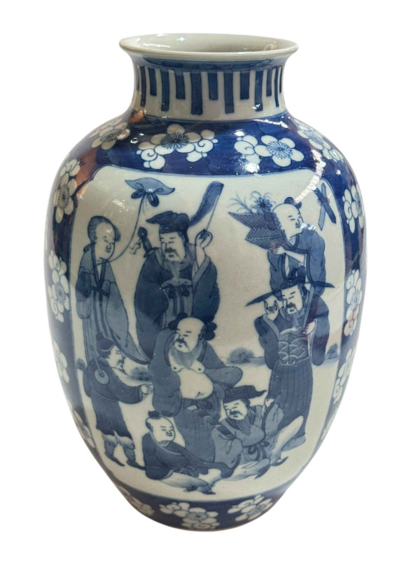 Chinese blue and white vase decorated with figures and prunus design, double ring mark to base, 29cm.