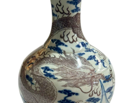 Large Chinese pottery vase decorated with dragon design on blue and white...