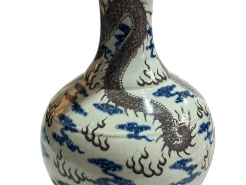 Large Chinese pottery vase decorated with dragon design on blue and white ground, 38cm. thumbnail