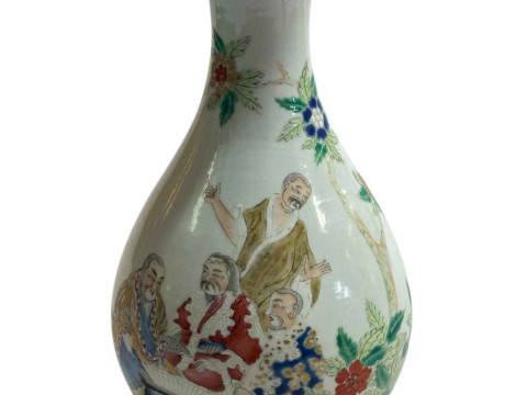 Chinese pottery vase decorated with figures and floral design, 23cm.