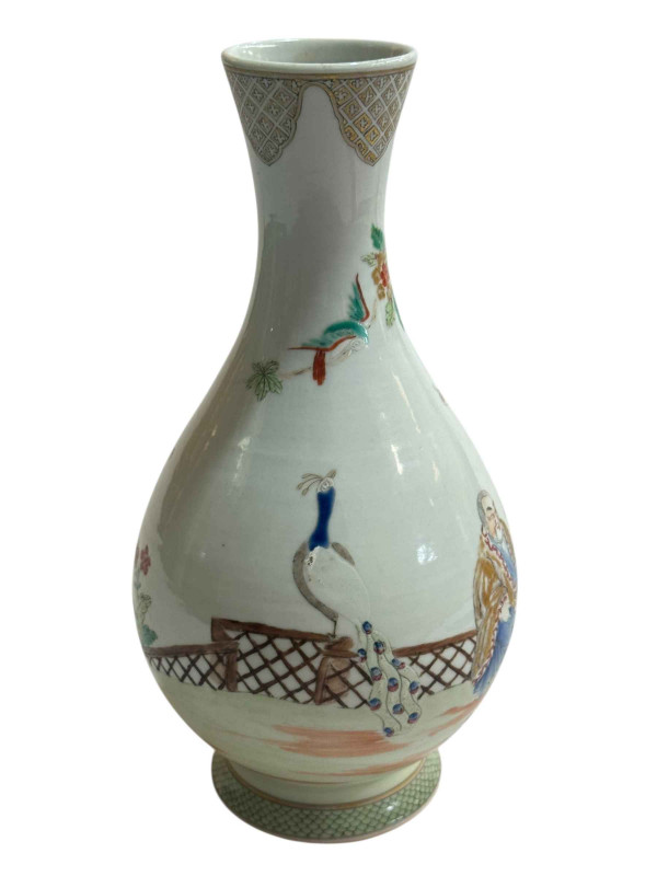 Chinese pottery vase decorated with figures and floral design, 23cm.