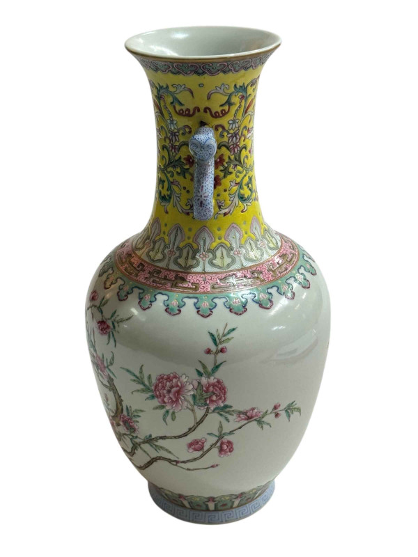 Chinese famille rose decorated vase with twin snake handles with iron red four character mark to base, 29cm.