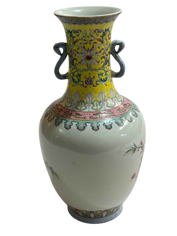 Chinese famille rose decorated vase with twin snake handles with iron red four character mark to base, 29cm.