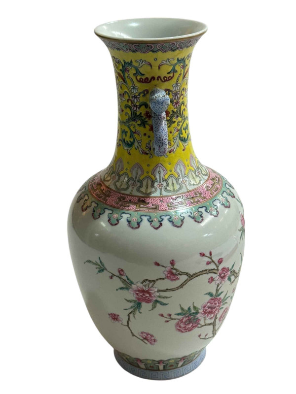 Chinese famille rose decorated vase with twin snake handles with iron red four character mark to base, 29cm.