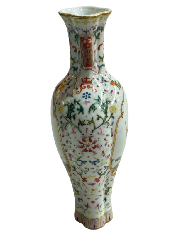 Chinese porcelain vase decorated with figural panels and floral borders with Jiaqing seal mark to base, 24cm.