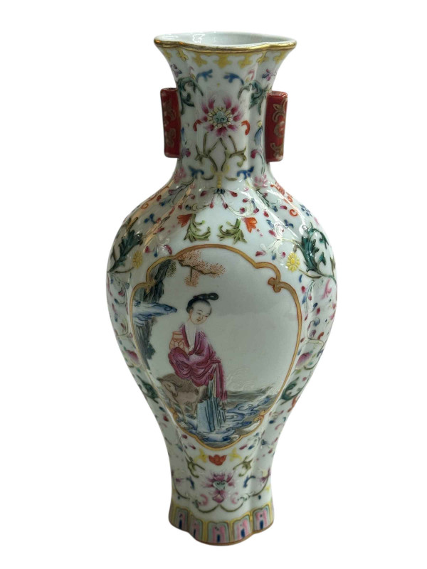 Chinese porcelain vase decorated with figural panels and floral borders with Jiaqing seal mark to base, 24cm.