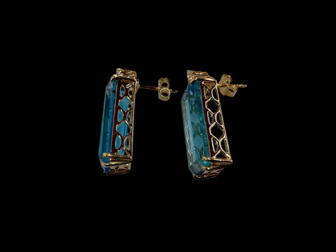 Pair of topaz and diamond drop earrings set in 9 carat yellow gold. thumbnail
