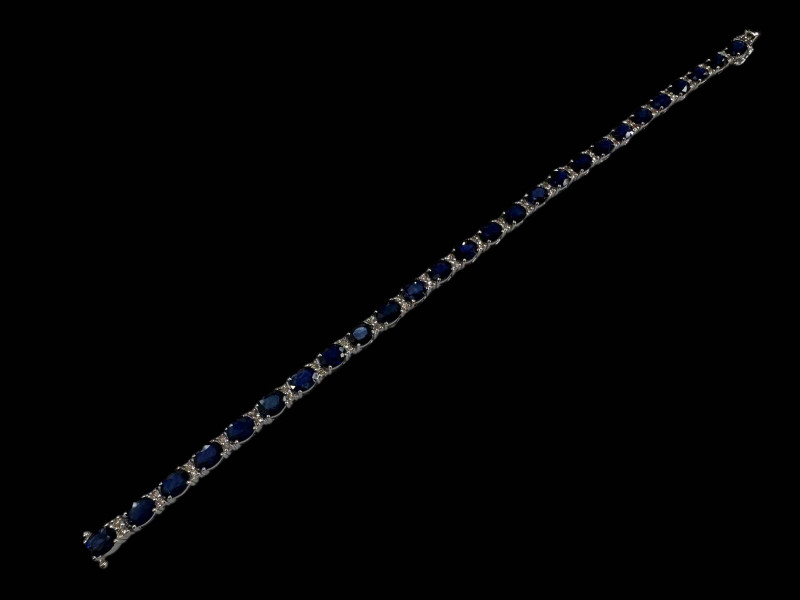 18 carat white gold, sapphire and diamond bracelet with sapphires totalling over 11.5 carats.