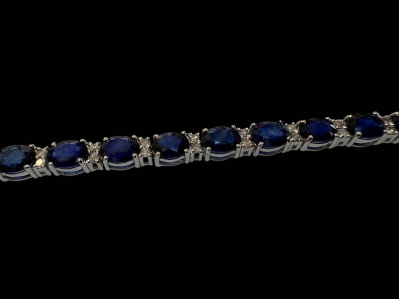 18 carat white gold, sapphire and diamond bracelet with sapphires totalling over 11.5 carats.