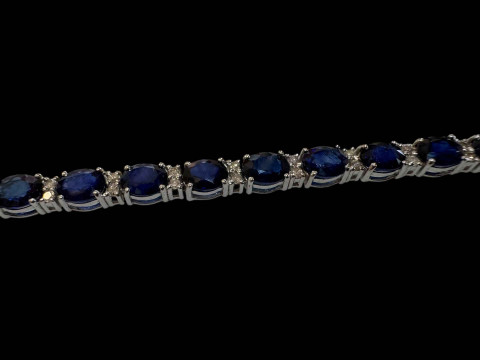 18 carat white gold, sapphire and diamond bracelet with sapphires totalling over 11.5 carats. thumbnail