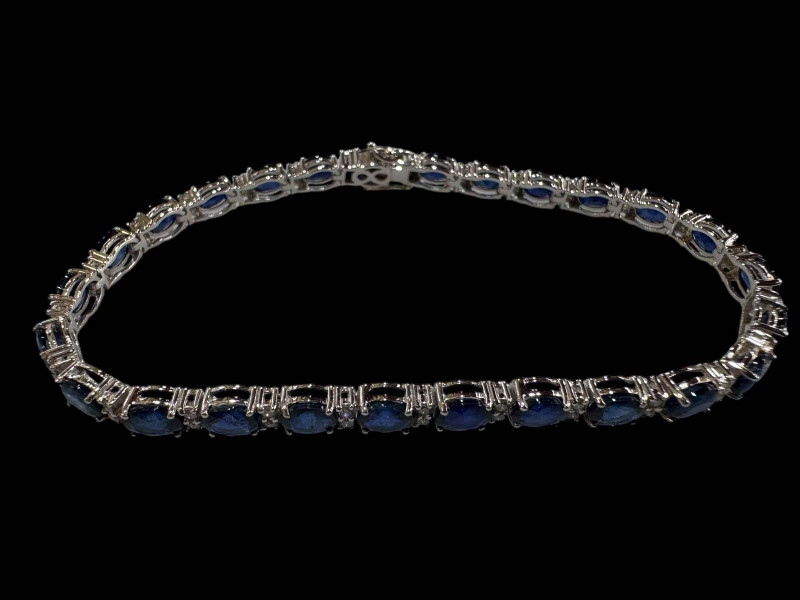 18 carat white gold, sapphire and diamond bracelet with sapphires totalling over 11.5 carats.