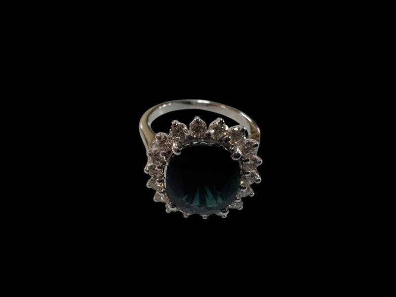 18 carat white gold, sapphire and diamond cluster ring with sapphires totalling over 5.5 carats.