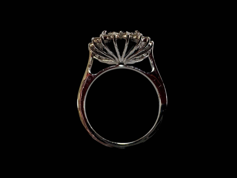 18 carat white gold, sapphire and diamond cluster ring with sapphires totalling over 5.5 carats.