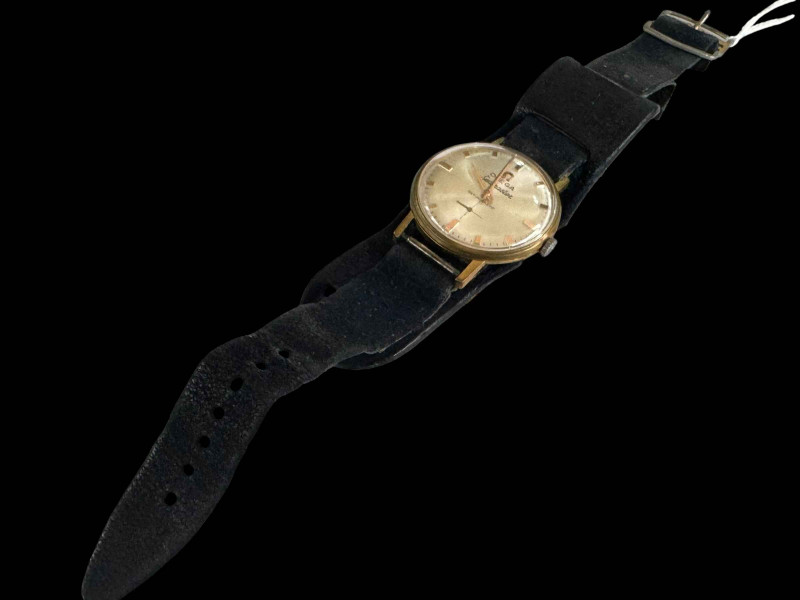 Gents 18 carat gold Omega Seamaster Antimagnetic wristwatch with leather strap, Number 16203.