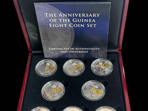 The Anniversary of the Guinea eight coin set with certificate.