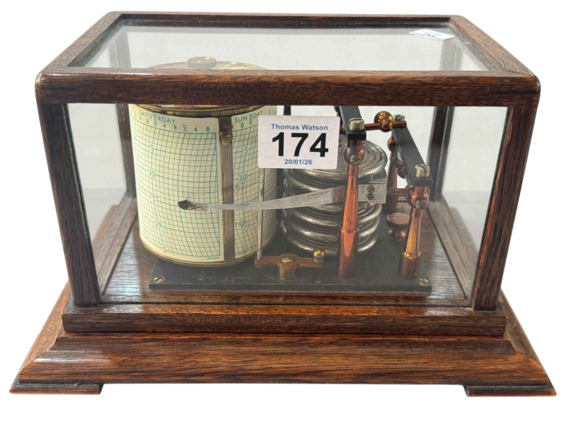 Small oak cased barograph by Negretti Zambra London, 13.5cm by 23.5cm by 15cm.