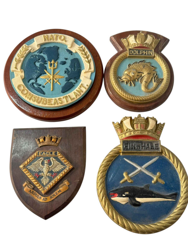 Four military plaques.