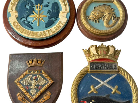 Four military plaques.