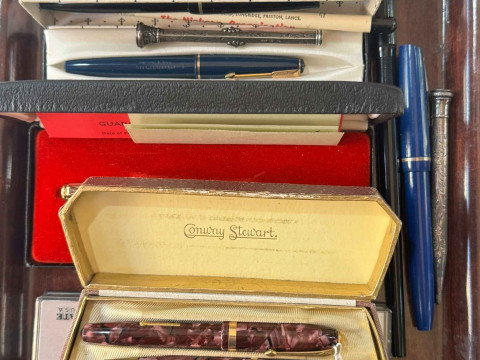 Selection of fountain pens and pencils including three with 14k nibs,...