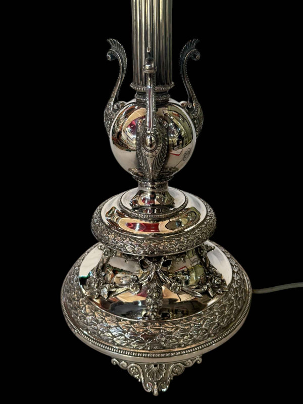 Victorian silver oil lamp converted to electric, the column having ancanthus decoration and detachable swags and on scroll form feet, hallmarked to base rim and reservoir holder, maker HW, Birmingham 1873, height to reservoir holder 47cm.
