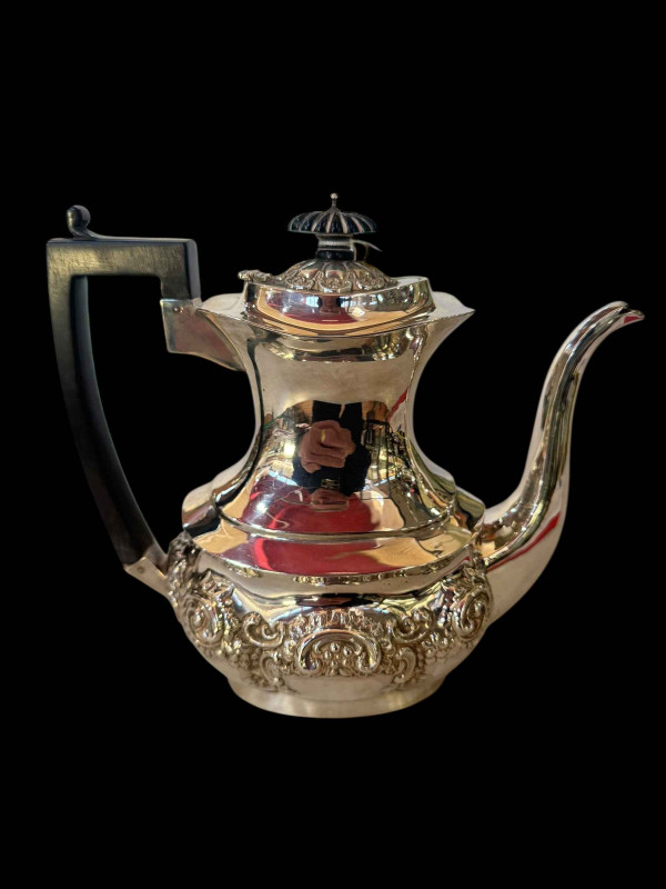 Edwardian silver coffee pot with embossed decoration, Birmingham 1906.
