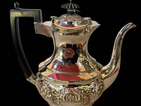 Edwardian silver coffee pot with embossed decoration, Birmingham 1906.