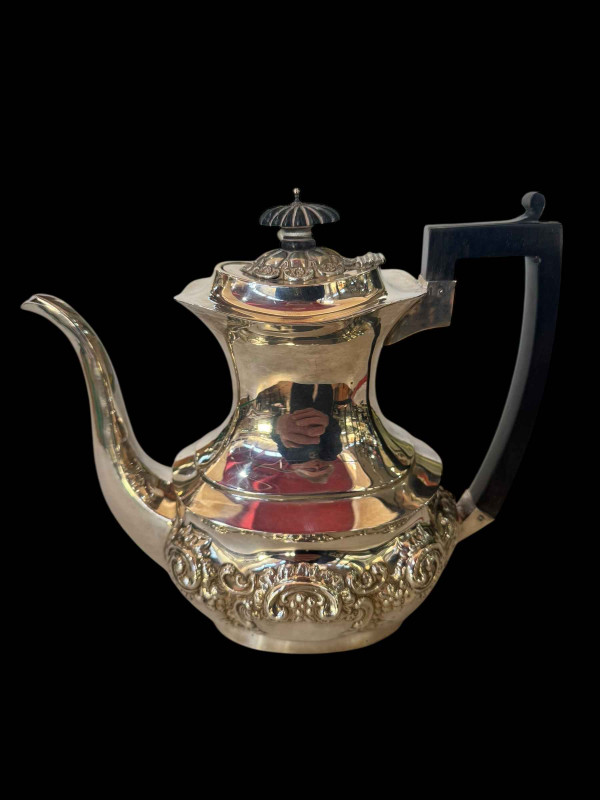 Edwardian silver coffee pot with embossed decoration, Birmingham 1906.