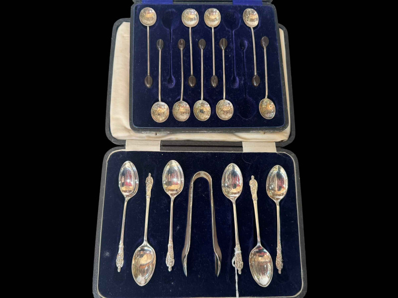 Cased set of silver Apostle teaspoons and tongs, and nine silver coffee spoons.