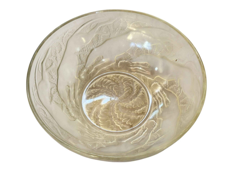 R Lalique glass bowl decorated with leaping dogs, 24cm diameter.