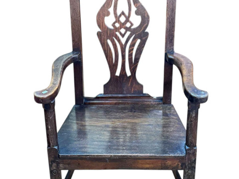 Chippendale style oak elbow chair.