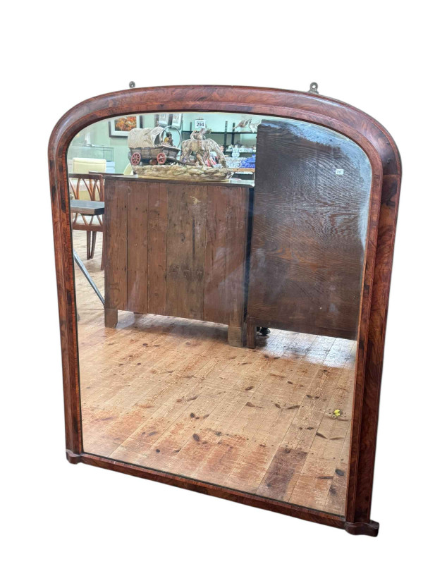 Victorian walnut and line inlaid arched top overmantel mirror, 132cm by 110cm.