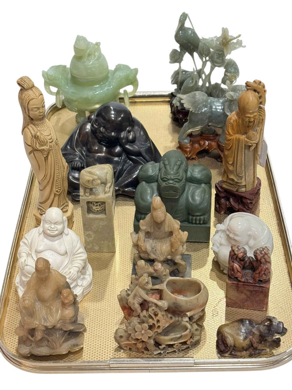 Collection of Buddha's and creatures in soapstone, jade and resin (16).