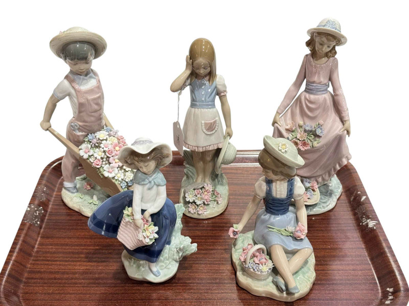 Five Lladro figures including Flowers in the Basket and Wheelbarrow with Flowers.