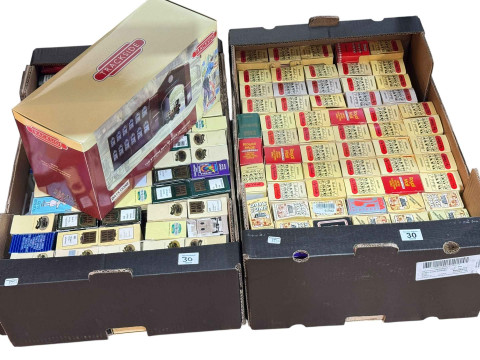 Two boxes of Lledo Days Gone diecast model vehicles.