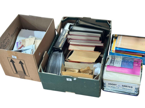 Stamp collection in various albums and boxes.