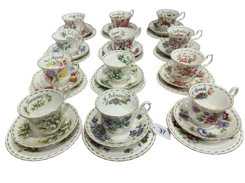 Twelve Royal Albert 'Flowers of the Month' trios.