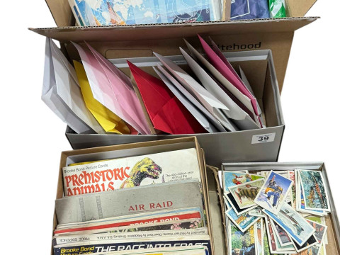 Box of stamps, first day covers and world stamps, and collection of cigarette...