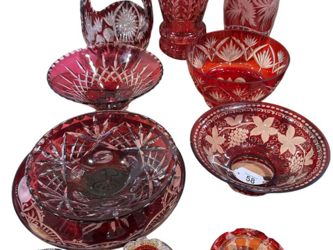 Collection of ruby decorated glassware including vases, bowls and horse...
