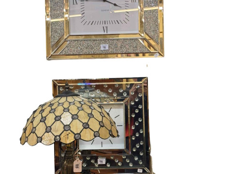 Two contemporary mirror panelled quartz wall clocks and table lamp (3).