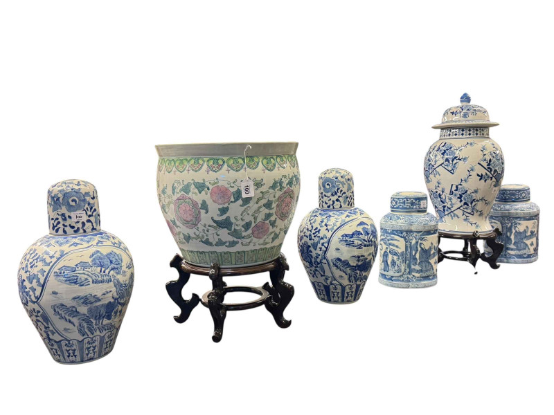 Oriental style fish bowl and stand, large blue and white vase, lid and stand, and two pairs of large Oriental style blue and white canisters and lids (6).