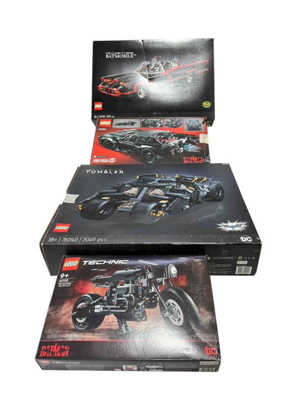 Four boxed Lego Batman vehicle construction kits, model numbers 76240, 76328, 42147 and 42155. *Lot sold as seen, contents not guaranteed, all boxes have been opened then re-sealed, no Condition Reports available on this Lot*