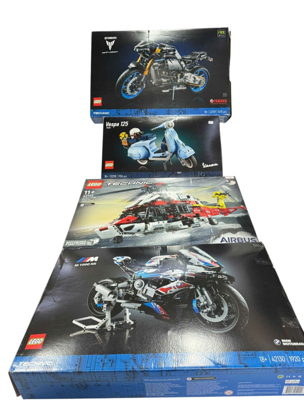 Four boxed Lego Motor Cycle, Scooter and Helicopter construction kits, model numbers 42130, 42159, 10298 and 42145. *Lot sold as seen, contents not guaranteed, all boxes have been opened then re-sealed, no Condition Reports available on this Lot*