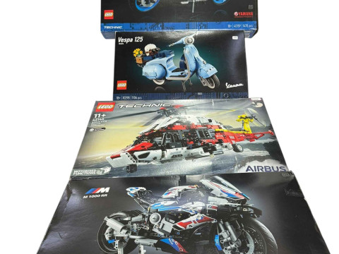Four boxed Lego Motor Cycle, Scooter and Helicopter construction kits,...
